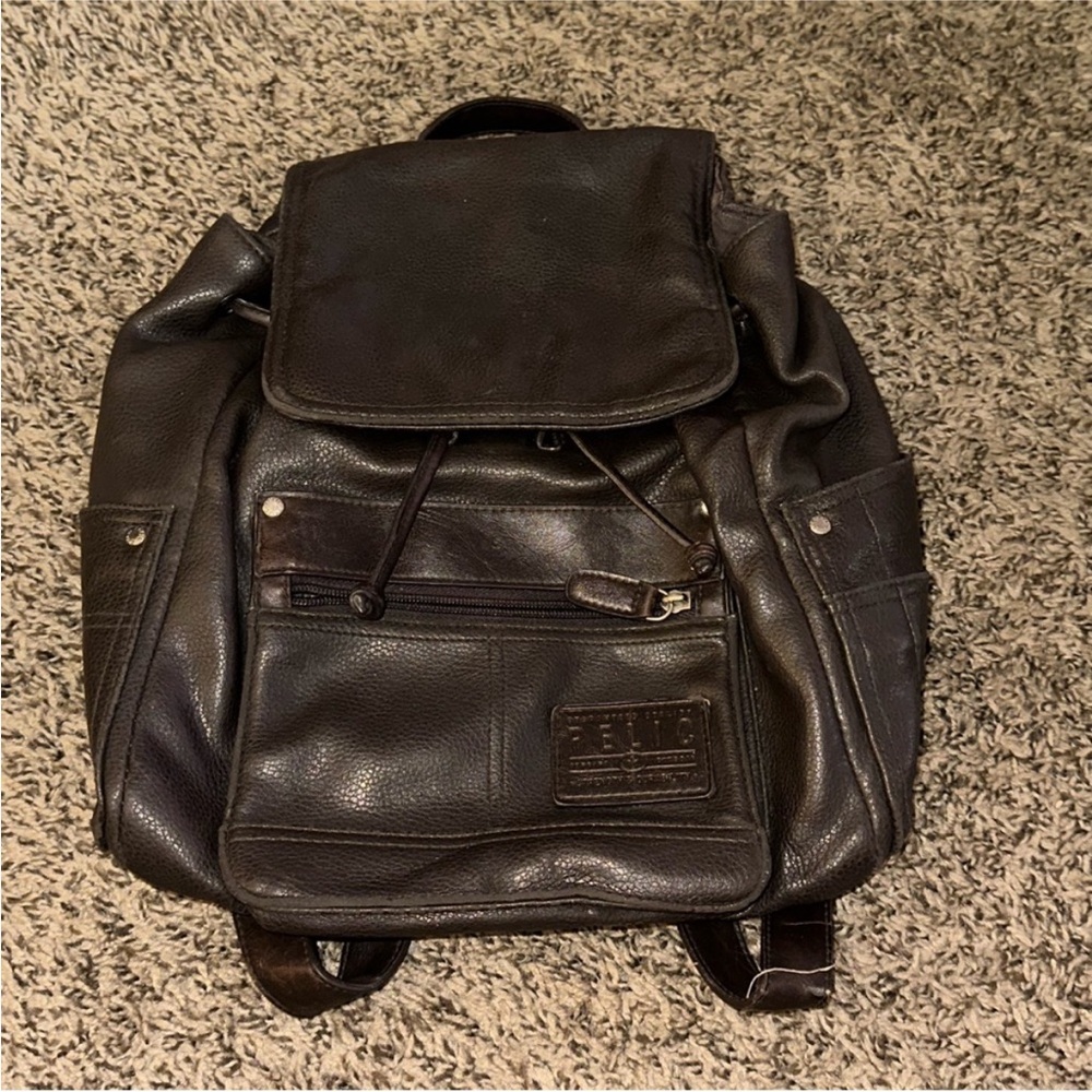 Relic Dark Brown  Backpack see pics for condition one of the straps messed up